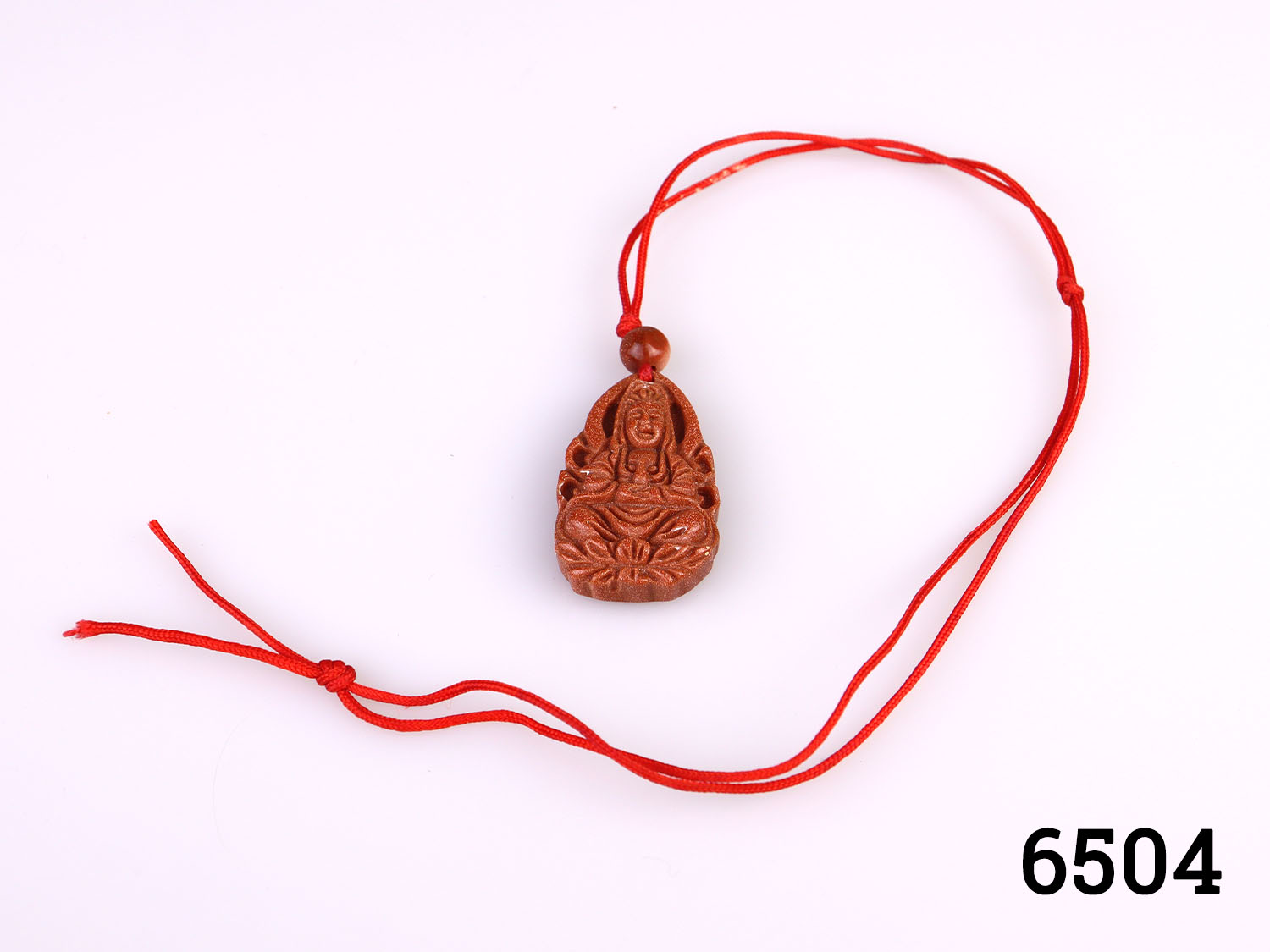 Carved Goldstone Guan Yin Pendant