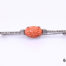Art Deco carved coral bar brooch with marcasite to either side. Not hallmarked but tests for silver. Brooch measures 66mm long with coral measuring 15mm by 10mm Brooch weight 4.5g Main photo showing brooch from the front
