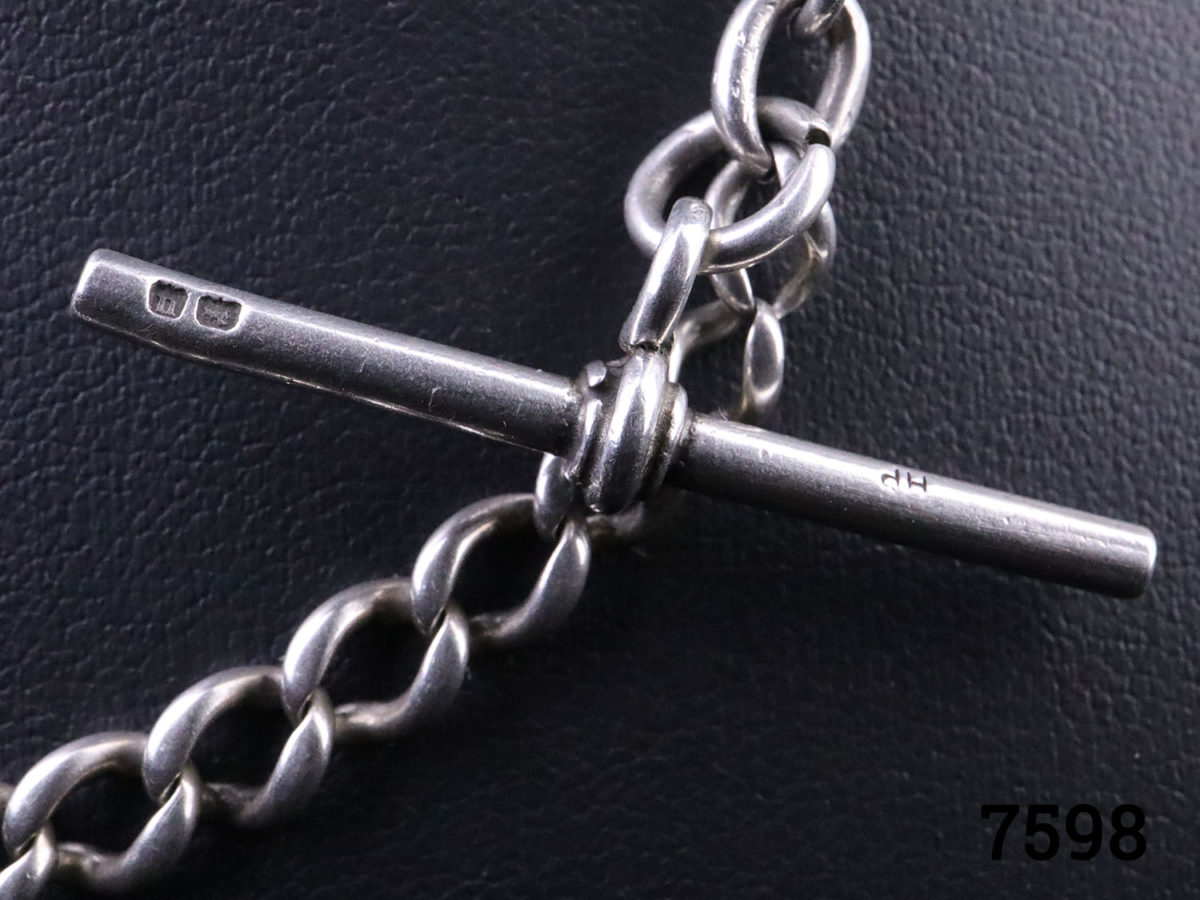 c1886 Victorian heavy solid sterling silver Albert fob watch chain. Lion passant hallmark on each link and on the T-bar Close up photo of the T-bar and hallmark