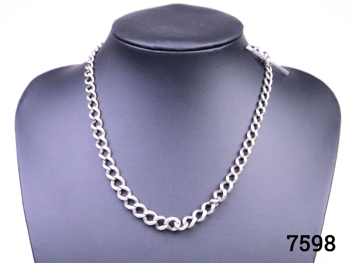 c1886 Victorian heavy solid sterling silver Albert fob watch chain. Lion passant hallmark on each link and on the T-bar Photo of chain on a display stand with T-bar to the back