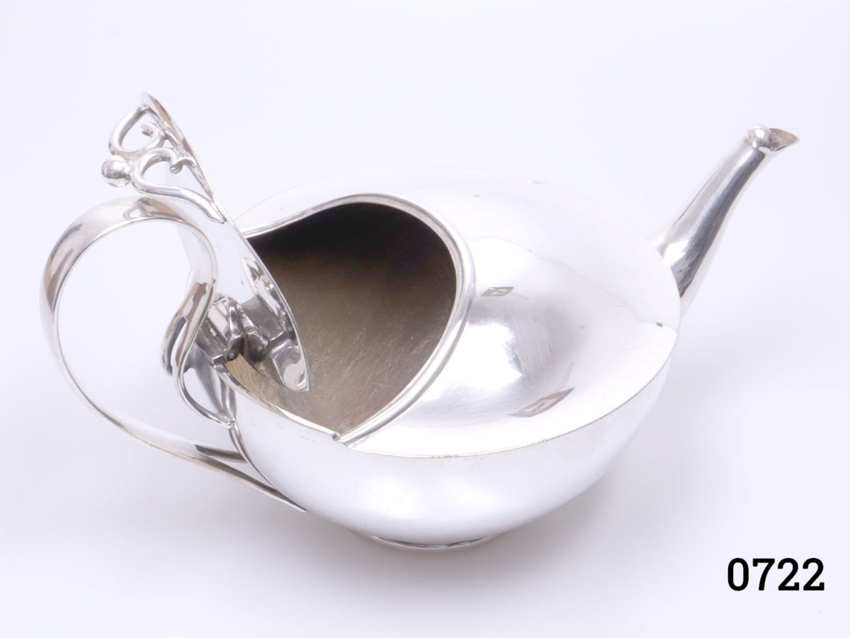 c1930s silver plate tea pot with evercool handle. Ali Baba style shape. Made by John Sherwood & Sons Base measures 67mm in diameter