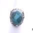 Vintage 1970s two tone turquoise stone ring. (Possibly Blue Ridge) Stone measures 18mm by 12mm. Ring size L / 5.75 Main photo showing ring on a flat surface from front view