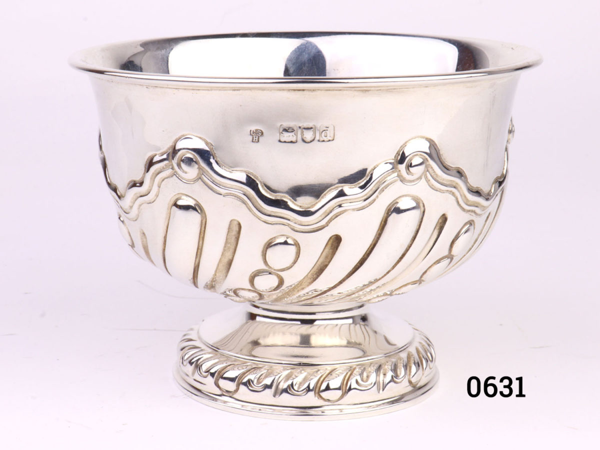 Antique sterling silver footed bowl. Fully hallmarked for London assay c1899 and made by Charles Stuart Harris. Measures 70mm in diameter at base and 115mm across the top. Main photo of bowl shown from an eye level angle with hallmark to the fore