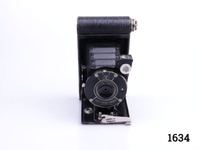 Antique Model B vest pocket Kodak camera with original case. Folding camera that fits into a vest pocket and used during the second world war. Leather pouch with initials A.E.M. on opening tab in good order but with some signs of wear. Main photo showing fully open camera from a front view