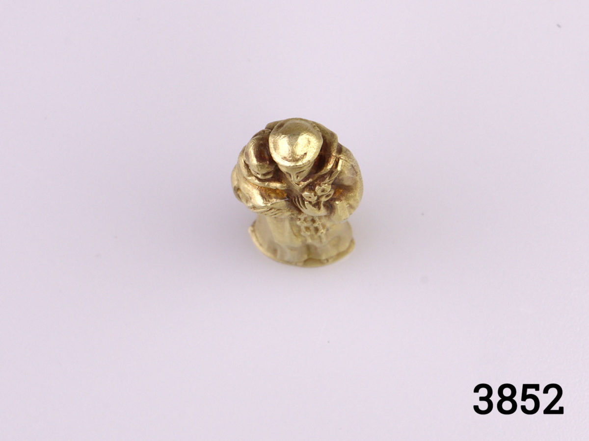 Early 20 century Tiffany & Co 14kt gold charm and case. 14kt gold charm of St. Anthony and herringbone patterned case. Stamped Tiffany & Co to the base of case and with initials L.S.D on lid. 14kt hallmark on inside of case lid and base of charm. Charm & case weighs 4.3g Case measures 24mm high and 10mm wide and 5mm deep