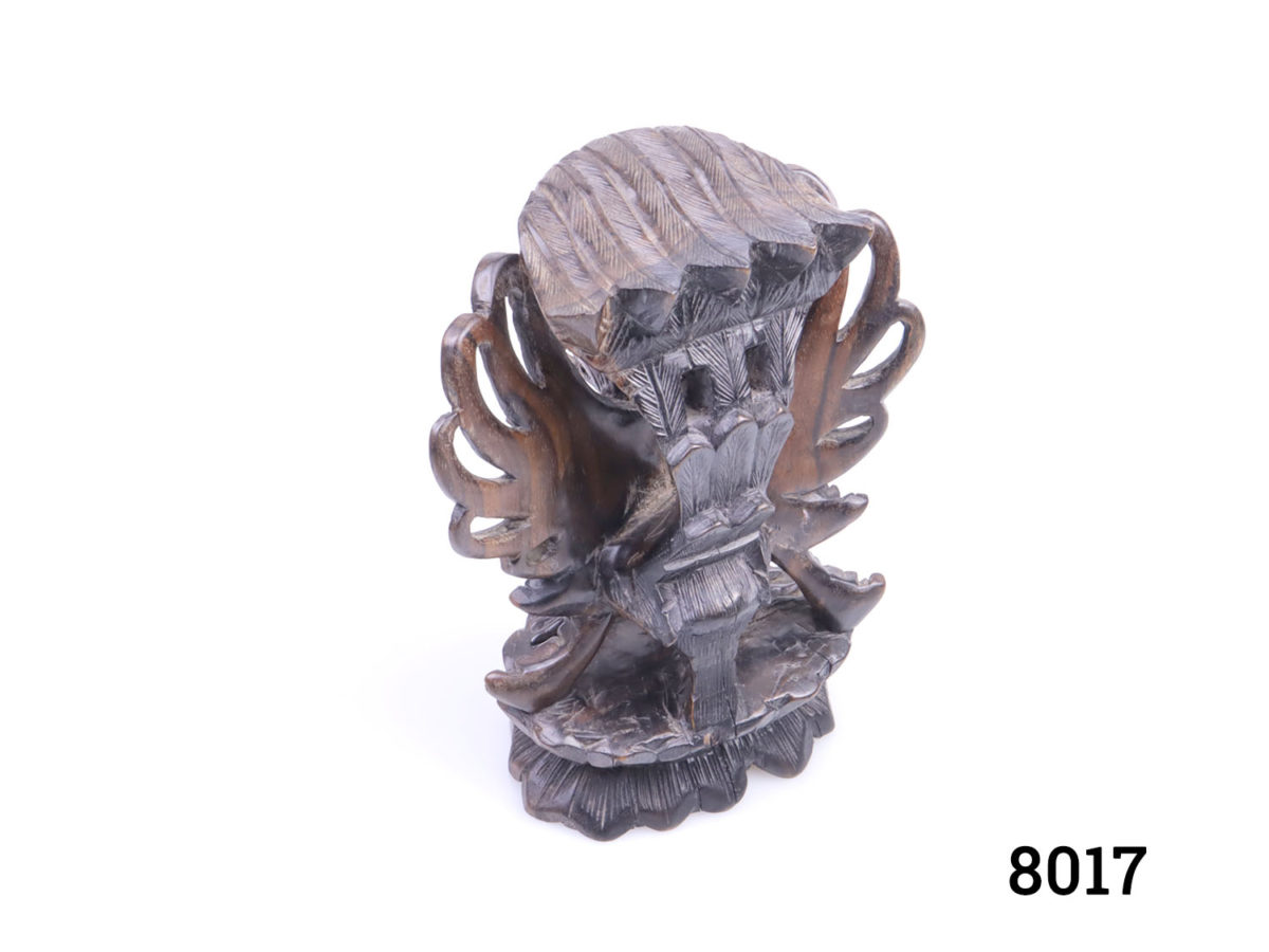 Vintage statue of an Indonesian Garuda bird. Intricately carved wooden statue with fine detailing. Probably teak. Base measures 80mm at longest and 65mm at widest Photo of back of statue