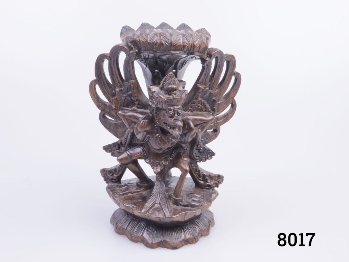 Vintage statue of an Indonesian Garuda bird. Intricately carved wooden statue with fine detailing. Probably teak. Base measures 80mm at longest and 65mm at widest Main photo showing full frontage of statue