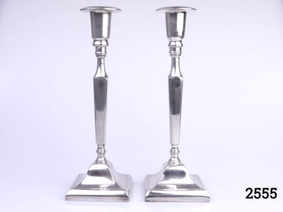 Pair of vintage Art Deco silver plated heavy candlesticks. Made in England. Each measure 77mm square at base Main photo of both candlesticks side by side