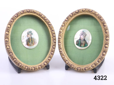 Pair of vintage Indian miniatures. Images of a Mughal Emperor and his wife hand-painted on shell mounted on green silk and housed in an oval gilt frame. Each frame measures 120mm long by 96mm wide 20mm deep. Main photo of Mughal Emperor & Empress side by side