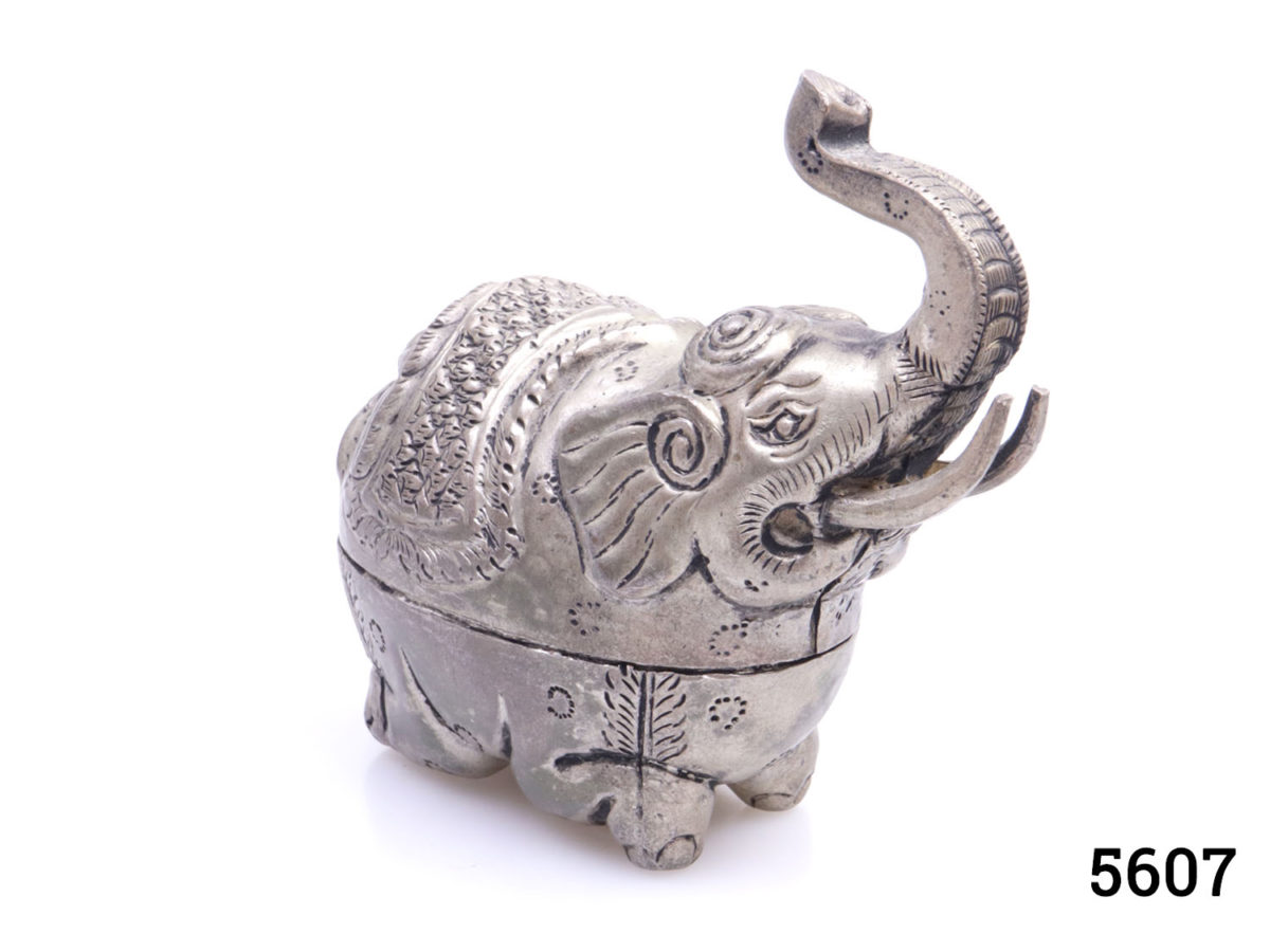 Genuine pre-1920s pair of Cambodian silver elephant condiment and mouth freshener containers. Large elephant measures 160mm at longest point, 70mm at widest and 145mm tall with hallmark of T900 to the belly Small elephant measures 85mm at longest point, 40mm at widest and 80mm tall with no visible hallmark. Photo of small elephant from an angled view