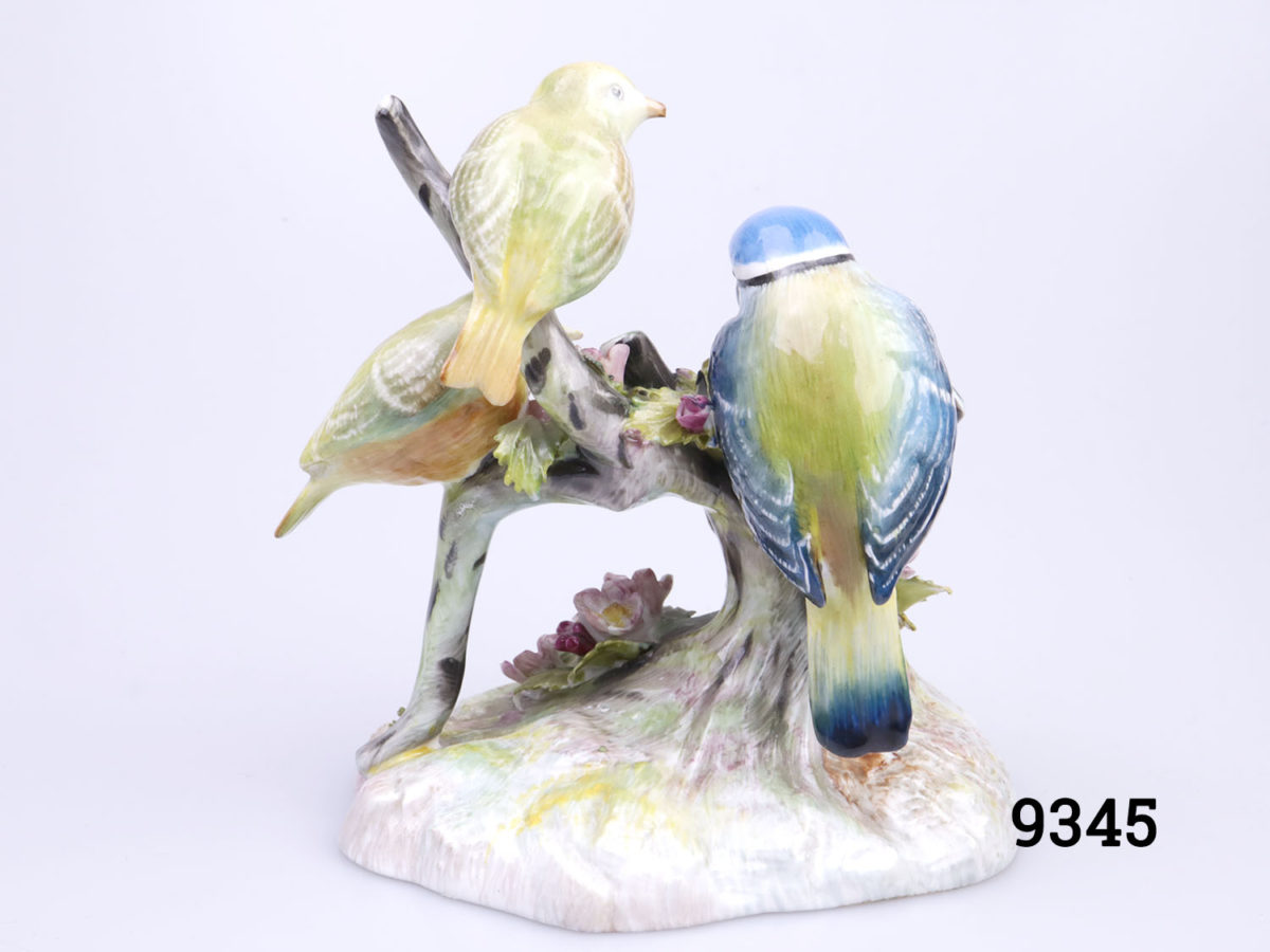 Royal Adderley bone china Blue Tit with young ornament. Colourful ornament with Blue Tit feeding its 3 young chicks. Base measures 115mm by 100mm Photo of ornament from the back