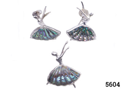 Vintage sterling silver and abalone paua shell ballerina set. Consisting of brooch and pair of screw-back earrings for non-pierced ears. (Back of one earring slightly bent) Made by Ataahua of New Zealand. Brooch measures 45mm at longest point, 35mm at widest and weighs 7.6g Earrings measure 25mm at longest point, 20mm at widest and weigh 4.3g Main photo showing the whole set with earrings laid at the top and brooch below