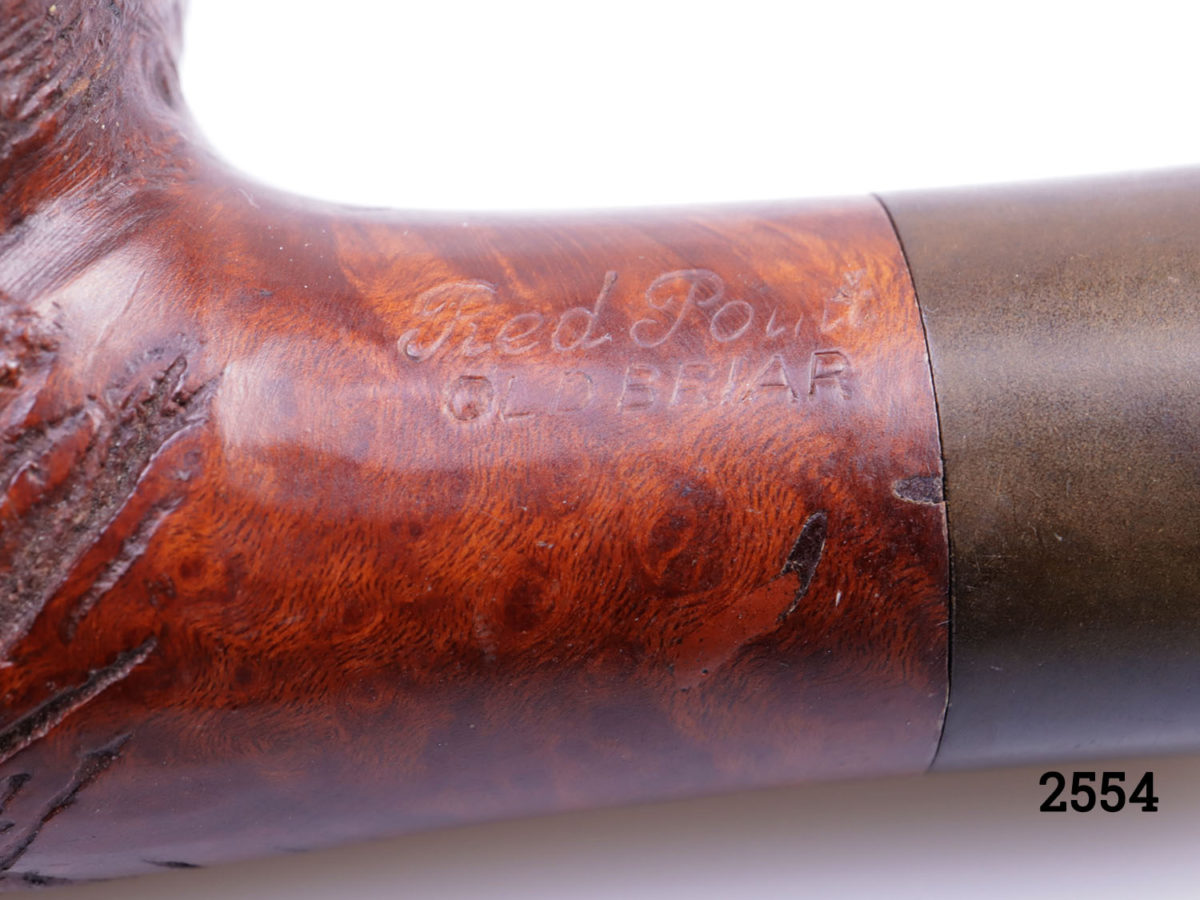 Vintage carved wooden smokers pipe with the head of an Eastern gentleman at the bowl. Marked Red Point Old Briar to the side. Head at bowl measures 55mm long by 48mm wide (at top) and 66mm high Close up of the makers mark (Red Point Old Briar)
