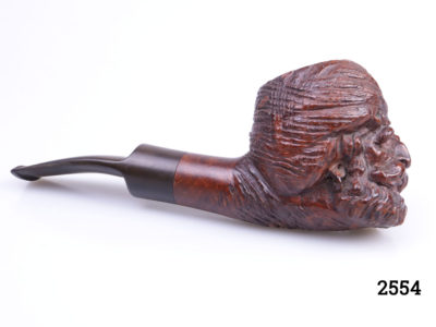 Vintage carved wooden smokers pipe with the head of an Eastern gentleman at the bowl. Marked Red Point Old Briar to the side. Head at bowl measures 55mm long by 48mm wide (at top) and 66mm high Main photo showing full length of pipe with head to the right
