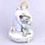 Vintage Continental porcelain figurine of a young lady feeding pigeons from a basket. No makers mark but numbered 1715 to base. Possibly German. (Some gilt wear to the base) Main photo showing lady facing forward and from a slight raised angle