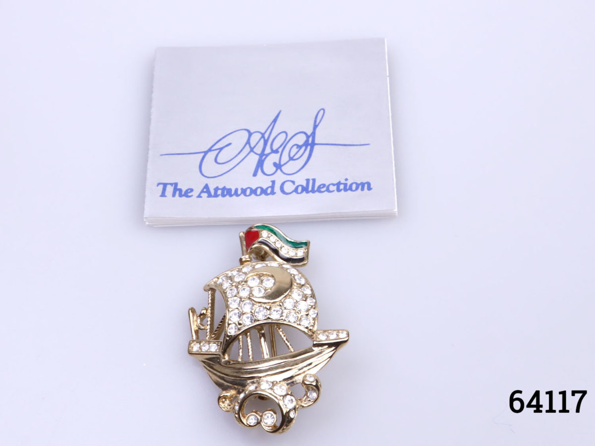 Vintage Attwood & Sawyer galleon ship brooch. Stamped A&S to the back Brooch measures 42mm long by 30mm at widest point and weighs 10grams Photo of brooch with small Attwood Collection booklet