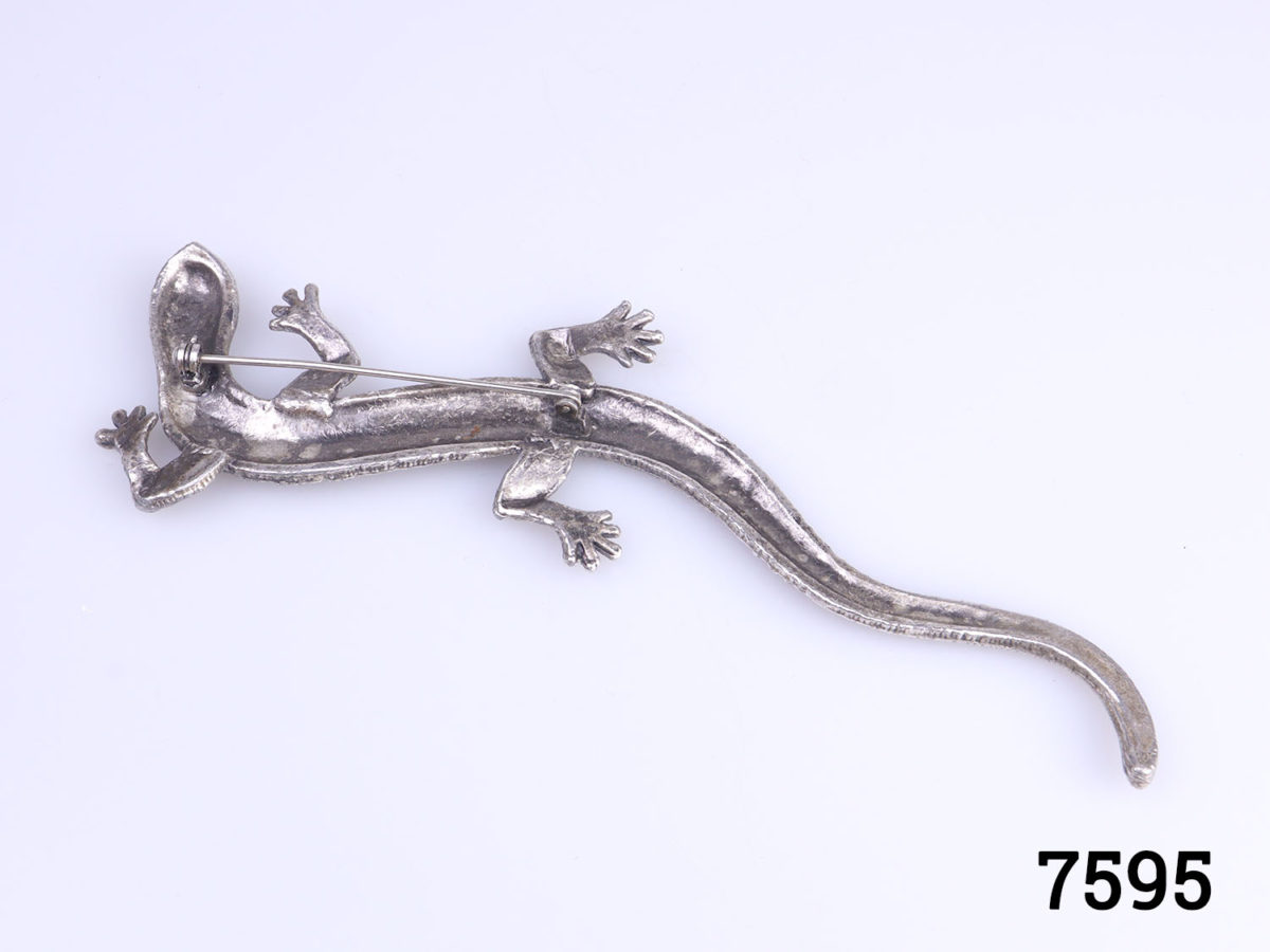 1980s vintage large silver metal lizard brooch with a scaly pattern. Statement piece for accessorising a coat or jacket lapel. Widest points measures 40mm Photo of underside of brooch