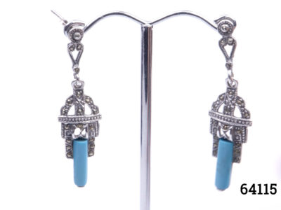 Vintage sterling silver earrings with turquoise and marcasite in an Art Deco style. Drop length of earrings 45mm. Earrings weight 5.7grams Main photo of earrings displayed on a stand