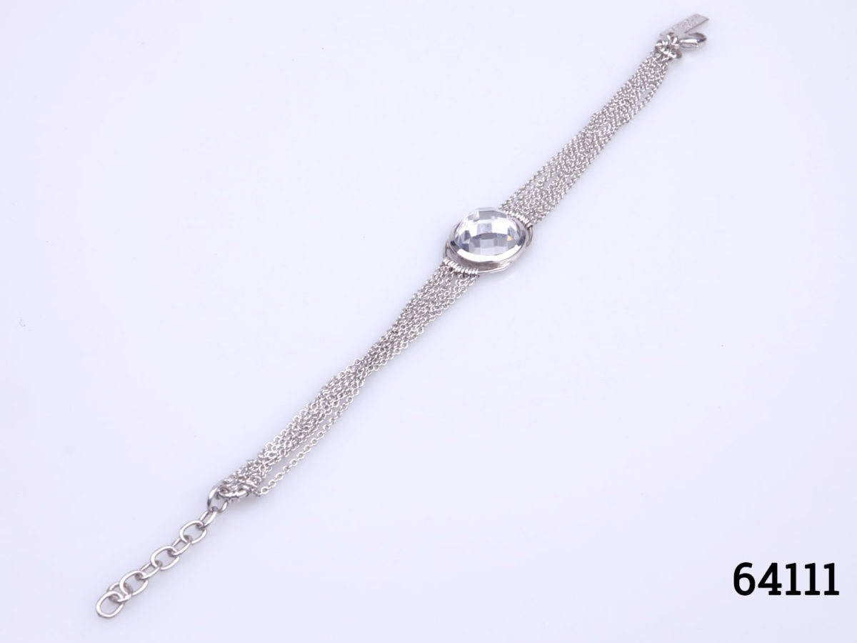 Vintage Vallès Dordal Paris sterling silver bracelet. Designer bracelet with 7 silver chain strands either side of faceted crystal ball in the centre. Slightly adjustable from 175mm to 210mm Bracelet weighs 15.2grams Photo of whole length of bracelet on a flat surface