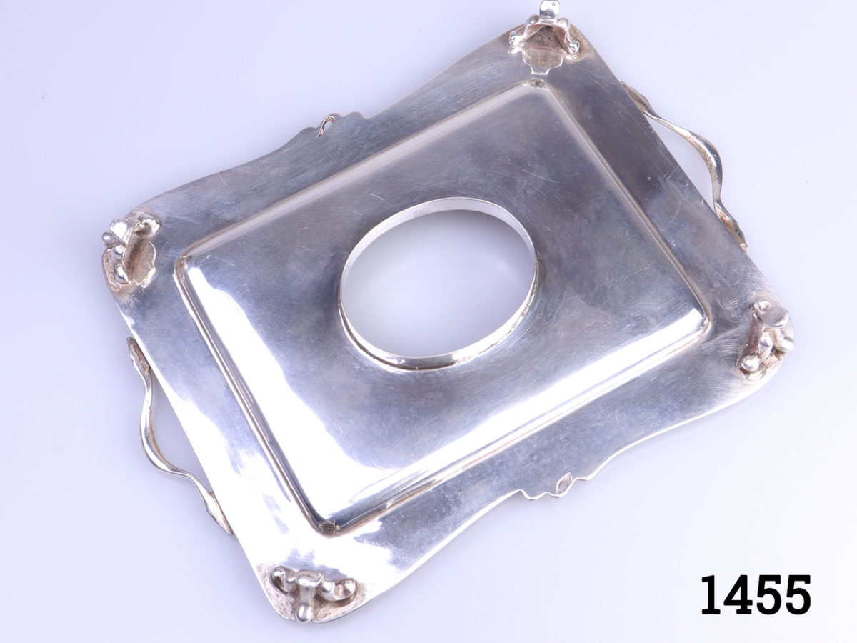 c1907 Birmingham assayed sterling silver and cut glass inkwell and stand. Inkwell sits securely in the hole in the centre of the stand. Inkwell weighs 190.6grams and measures 52mm x 45mm and 70mm tall. Stand measures 150mm long (including handles) and 110mm wide and weighs 95grams Photo of the base of the tray