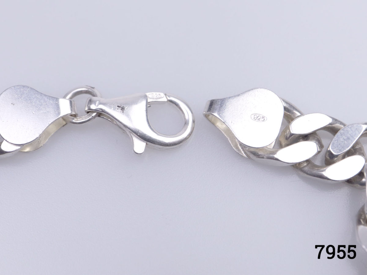 1970s solid sterling silver curb chain bracelet. Hallmarked 925 for sterling silver Close up photo of the clasp