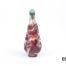 19th Century Peking glass snuff bottle. Teadrop shaped clear glass bottle with red floral overlay and green glass topped spoon. Main photo of upright bottle with stopper in place and showing width