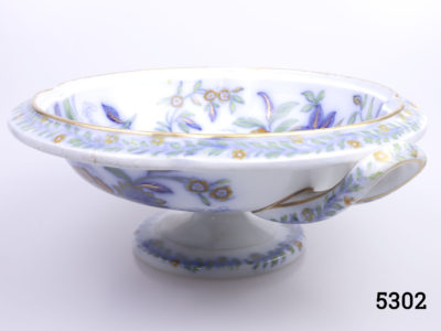 Antique Copeland & Garrett pedestal bowl with handles. Hand decorated with floral scene of blue, orange and gilt. Stamped with makers mark to the base. c1833-1847 Measures 95mm in diameter at base and 215mm across the top Main photo of bowl diagonal view with handles situated top left and bottom right corner