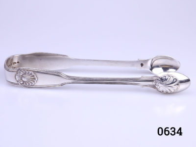 c1843 Fiddle thread shell tongs by George Adams. Fully hallmarked Main photo showing tongs from the side with spoon ends on the right