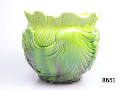 Antique Palissy plant pot in green cabbage leaf style pattern. (Some chips on the base rim) Measures 120mm in diameter at base. Main photo showing pot from an eye level angle