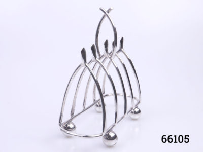 Vintage Mappin & Webb silver plate toast rack. A novelty 4 piece toast rack with the dividers in the form of wishbones on 4 ball feet. Signed Mappin & Webb on the base with Rd No. 296773. Also letters on the side of each tip of wishbone along with date 1901 Main photo of rack shown from a diagonal angle showing the wishbone shape
