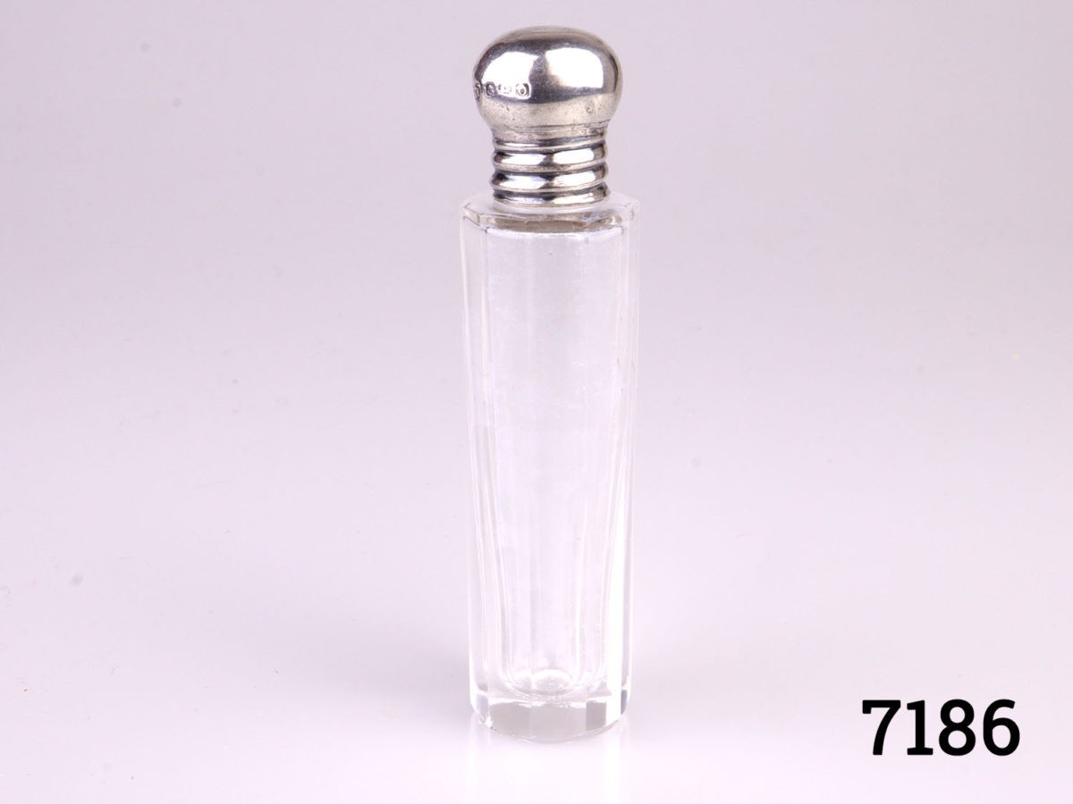 c1913 Birmingham assayed sterling silver screw-top lidded scent bottle. Fully hallmarked to side of the lid and made by Henry Clifford Davis. Measures 20mm in diameter at base Main photo of bottle with lid and stopper in place