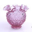 Vintage Fenton pale cranberry glass vase. Crinkle rimmed lip and diamond shaped pattern to body. Measures 50mm in diameter at base and 125mm in diameter across the top Main photo showing whole vase from eye level