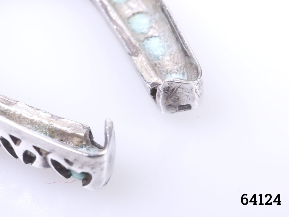 Vintage Egyptian silver horseshoe pendant. Lucky horseshoe encrusted with small turquoise bead stones all the way round. Drop length 45mm from bail Close up photo of the ends of the horseshoe showing hallmark
