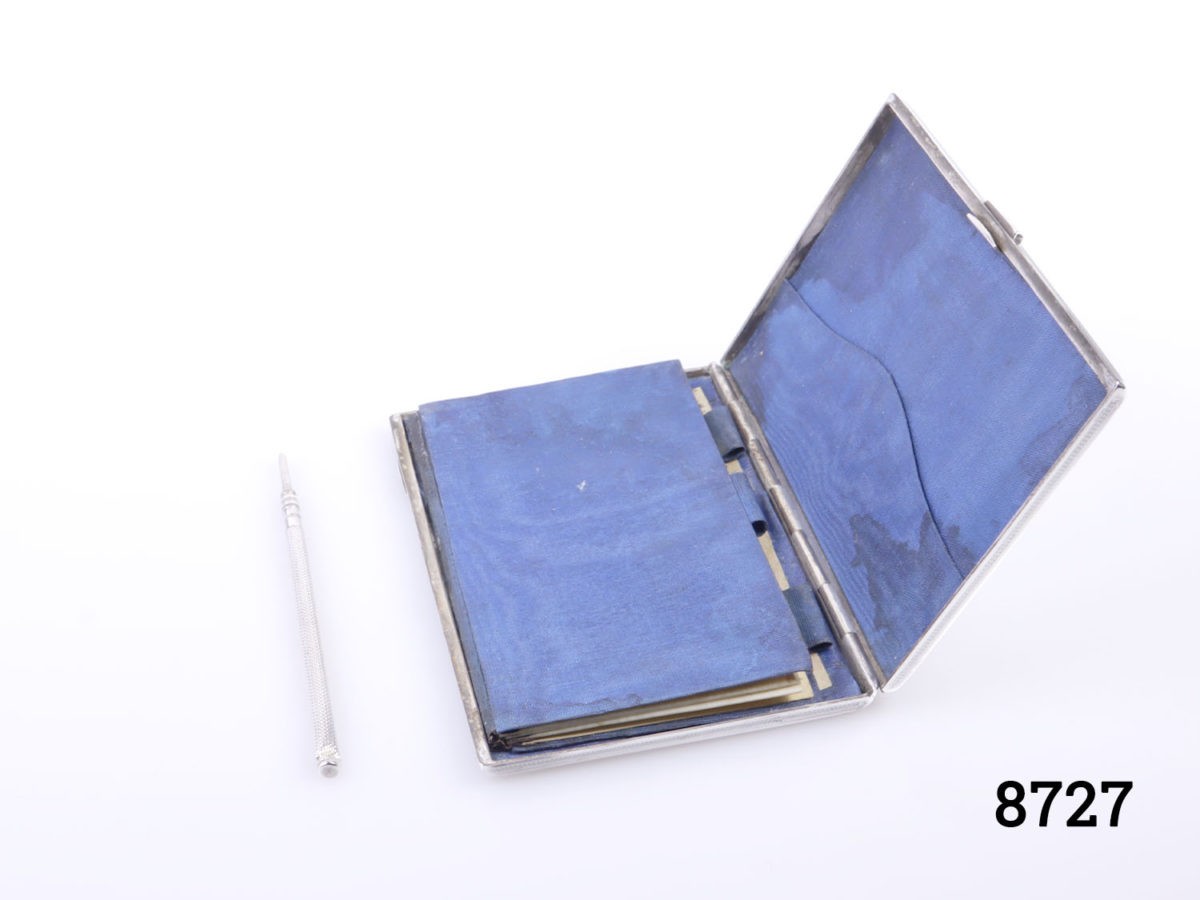 c1870 Birmingham assayed sterling silver notebook/diary case. Silk lined interior with partially written diary. Fully hallmarked to the exterior side. Made by Frederick Marson. (Some signs of wear) Photo of open case with silver pencil removed and placed to the left