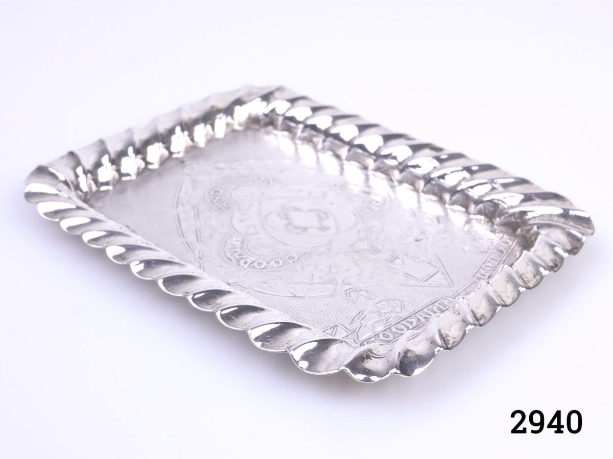 c1892 London assayed sterling silver playing card tray. Decorated with all 4 card suits etched on the inner tray. Fully hallmarked to the base. Main photo of tray seen from a diagonal angle