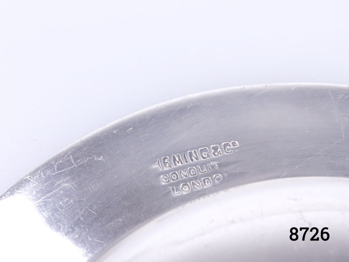 c1952 London assayed sterling silver coin/trinket dish. Fully hallmarked for sterling silver with Queens head for Coronation year. Measures 95mm in diameter across the top and 66mm across the base. Photo of the makers mark under the rim of the dish