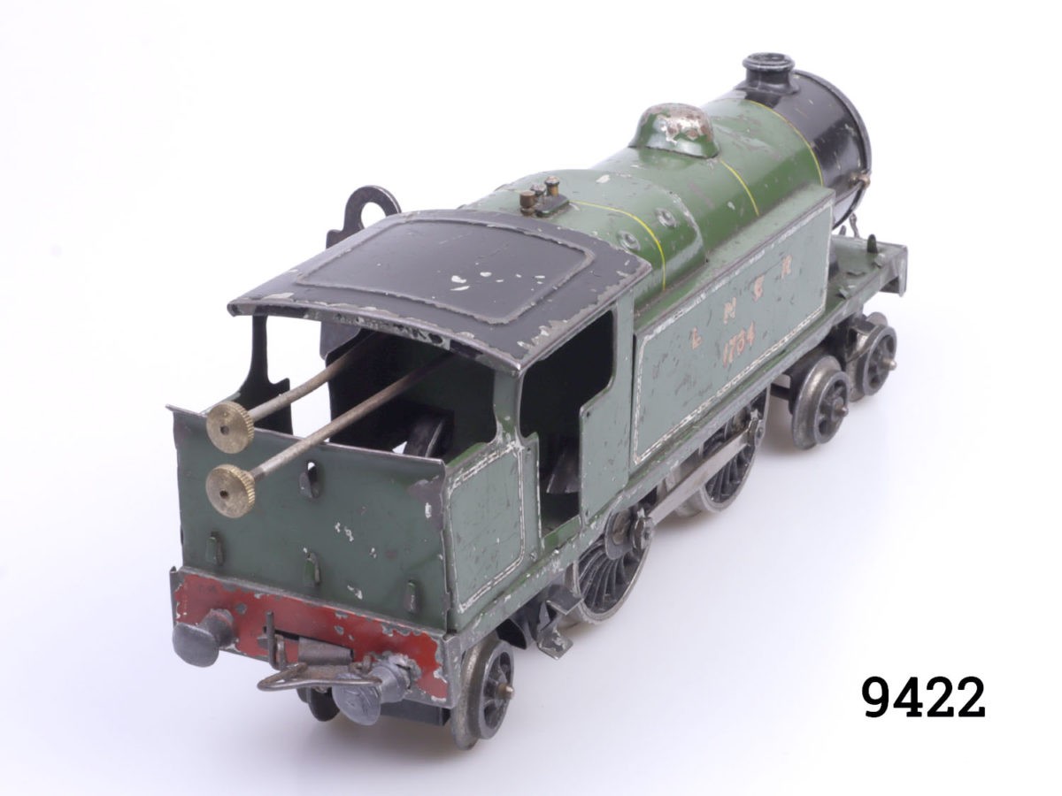 Vintage pre-war Hornby tank locomotive. In good working order. Key included. Photo of back of train seen diagonally with back end seen bottom left