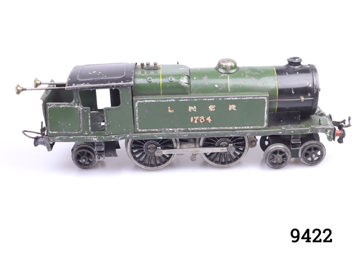Vintage pre-war Hornby tank locomotive. In good working order. Key included. Photo of locomotive from the side with front end facing right
