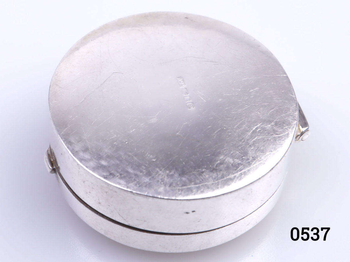 c1990s vintage small sterling silver circular box inscribed "My First Curl" Fully hallmarked to the base for London assay. Measures 30mm in diameter Photo of base of box showing hallmark