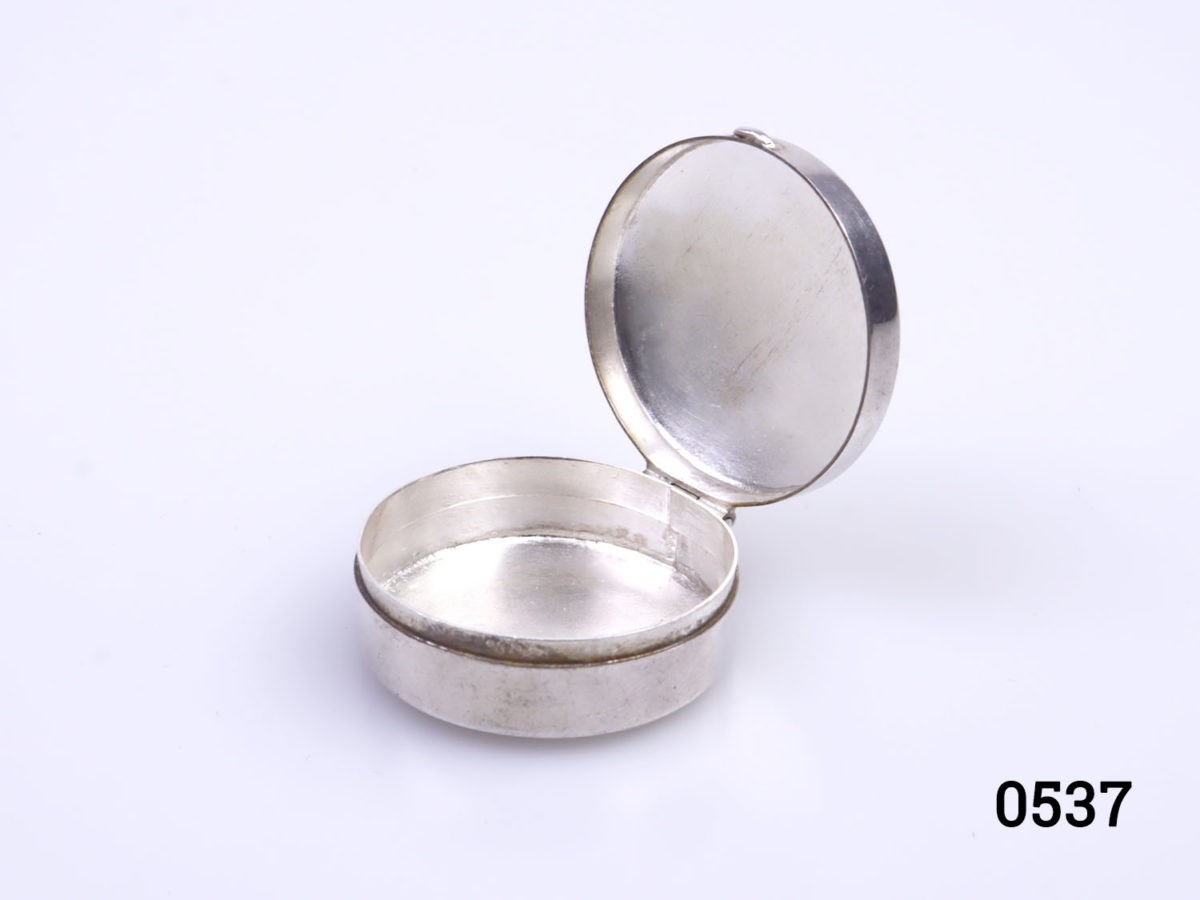 c1990s vintage small sterling silver circular box inscribed "My First Curl" Fully hallmarked to the base for London assay. Measures 30mm in diameter Photo of box with lid open showing interior
