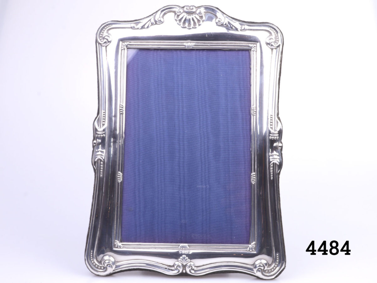 c1993 Sheffield assayed sterling silver photo frame. Made by Carr's of Sheffield Ltd. Fully hallmarked at the centre bottom of the frame. Main photo of frame seen straight on