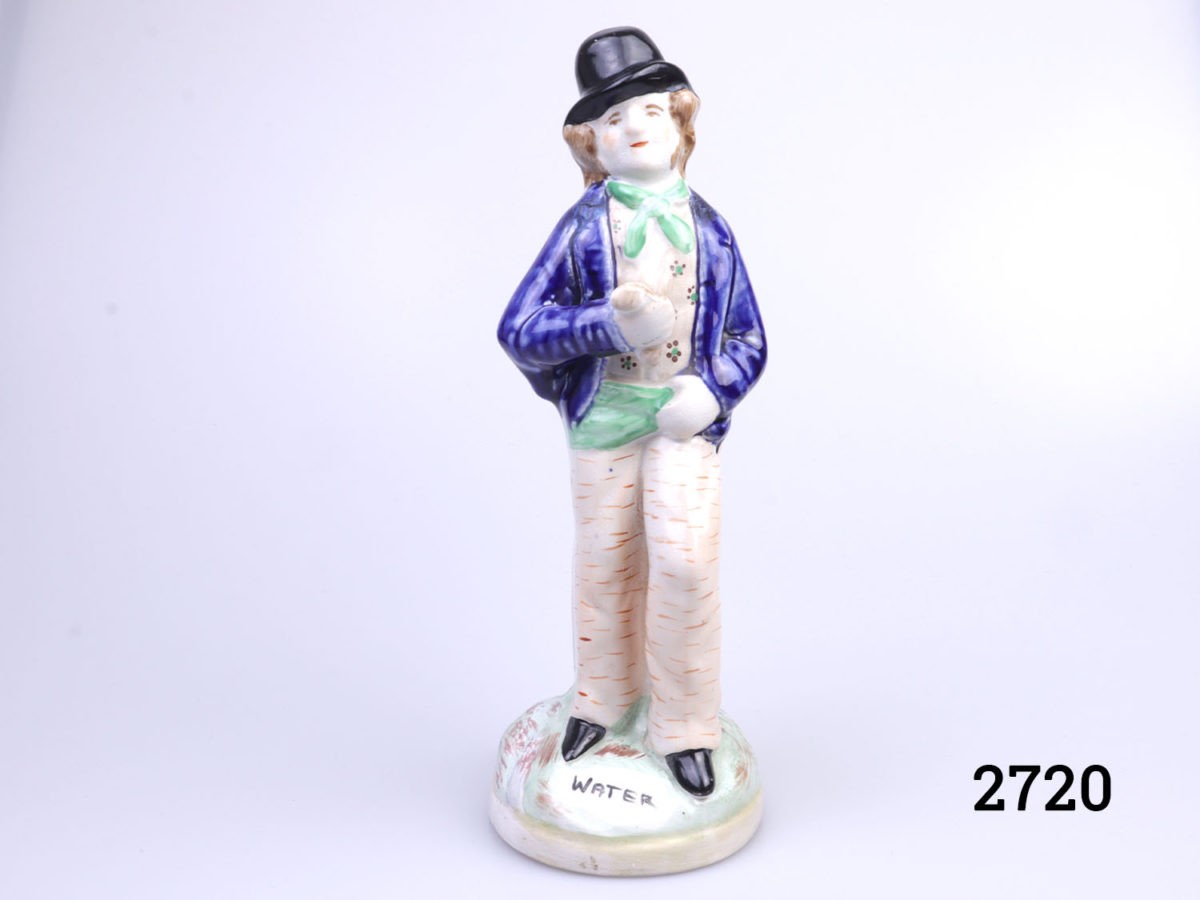 Vintage 2 sided Staffordshire Pottery figure. Water to one side, smartly dressed in bright colours with a happy smiling face and gin side looking dishevelled in grey and confused face. Main photo showing the happy smiling face of the water drinker