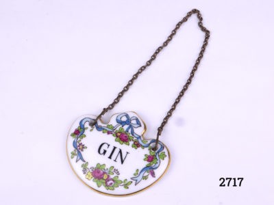 Fine bone china hand-painted Gin decanter label by Crown Staffordshire England. Drop length 120mm Main photo of decanter label laid out fully extended on a flat surface with front of label showing