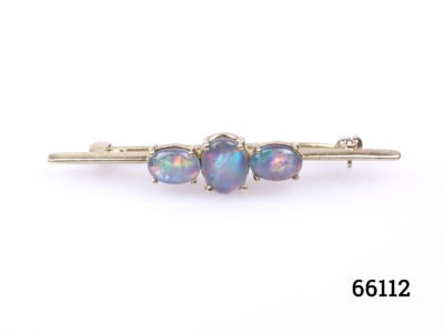 Modern gilt sterling silver bar brooch set with 3 synthetic opals. Hallmarked 925 for sterling silver to the back of brooch. Main photo showing brooch from the front