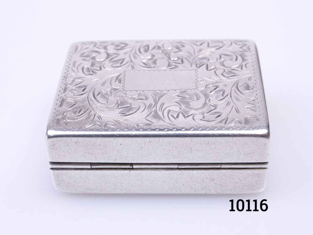 Vintage 950 grade silver pill/ snuff box. Hallmarked sterling 950 inside. Scrollwork to the lid with a vacant cartouche for personalisation. Photo of hinged back of box