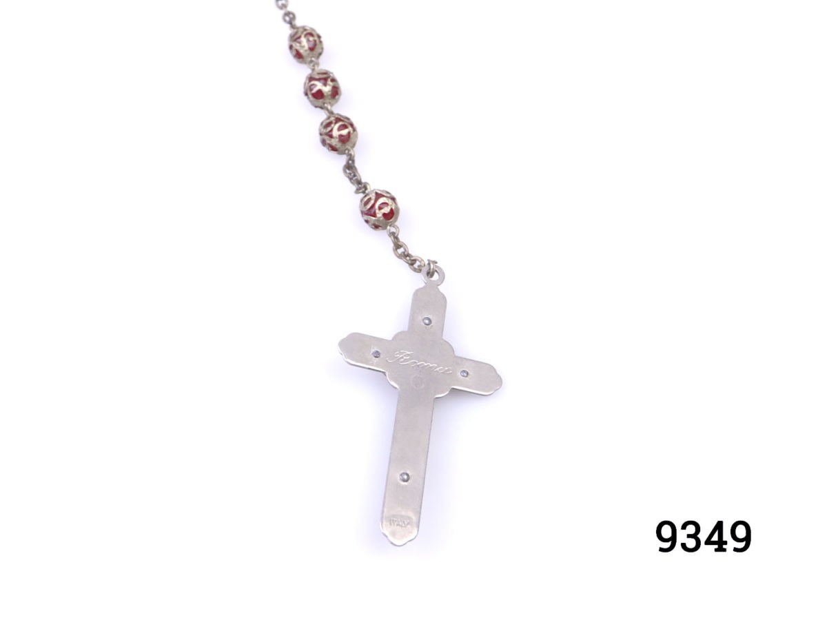Vintage Italian rosary beads and crucifix. Long rosary beads with metal covered red glass beads and crucifix with Roma impressed in the back. Crucifix measures 55mm long by 32mm at widest point Back of crucifix showing impressed Roma mark