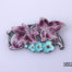 Vintage silver brooch with enamelled floral frontage. Hallmarked silver to the back. Main photo of brooch front with purple leaves at the top and light blue flowers below