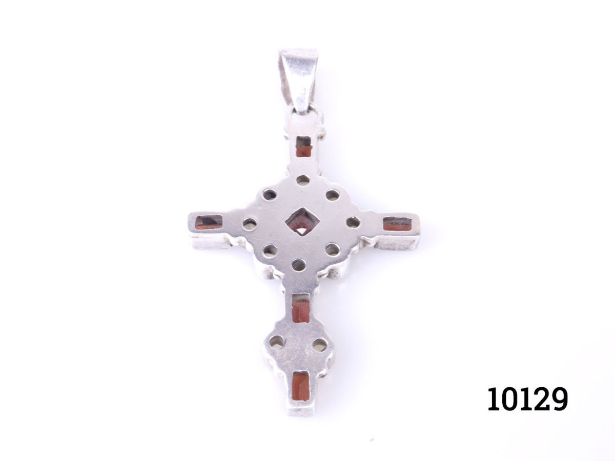 Vintage silver cross encrusted with oval cut wine red garnets and round cut pale lemon citrine stones. Not hallmarked but tests for sterling silver. Photo of back of pendant