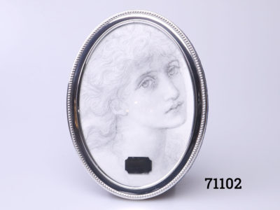 c1994 925 Sterling silver oval photo frame. Fully hallmarked to the side for Sheffield assay by Carr's. Main photo of frame seen from the front