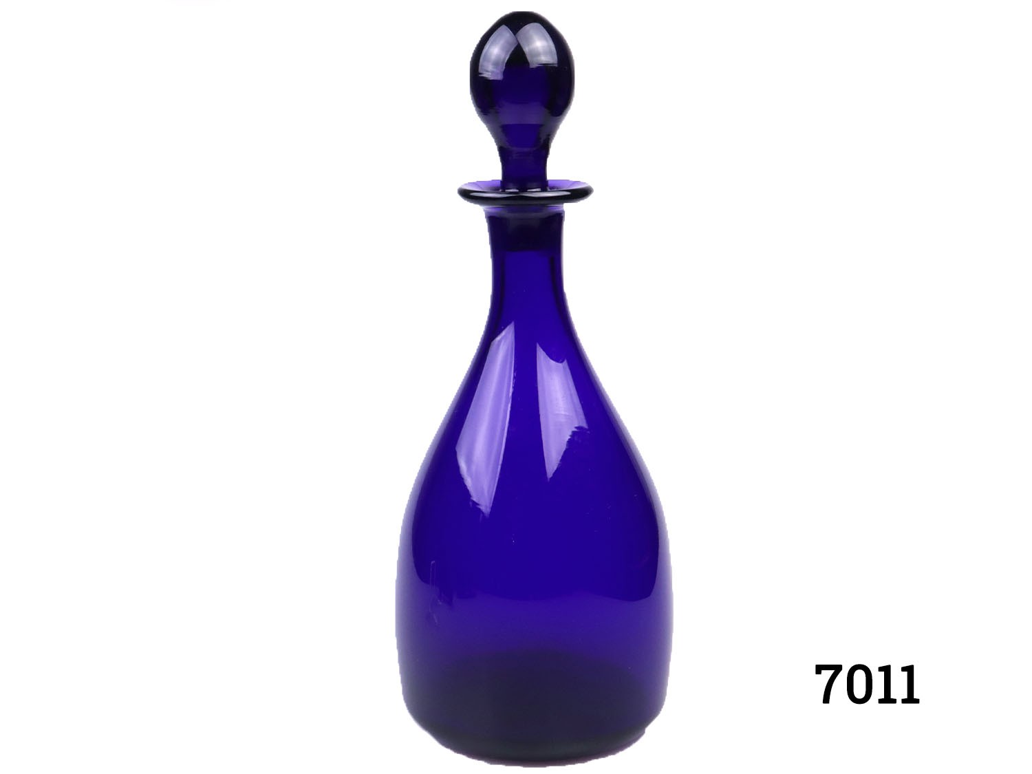 Vintage Thomas Webb Bristol blue decanter. Small chip on the collar. Measures 105mm in diameter at base and 50mm in diameter across the top. Main photo of decanter seen from n eye level angle with stopper in place